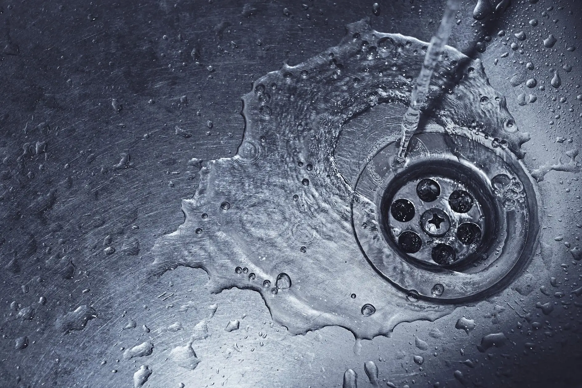 Deep cleaning of a main sink drain in a residential property in Northwest Indiana.